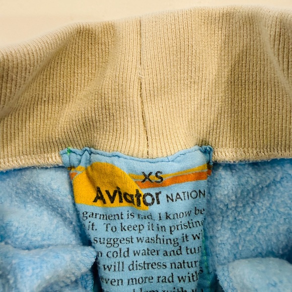 Woman’s Crewneck Sweatshirt and sweatpants with Rainbow hem, sleeve and cuffs. - Picture 3 of 4